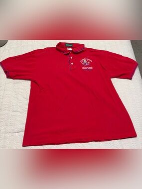 Outer Banks Red Polo with Embroidered 'Celebrate Freedom' Crest